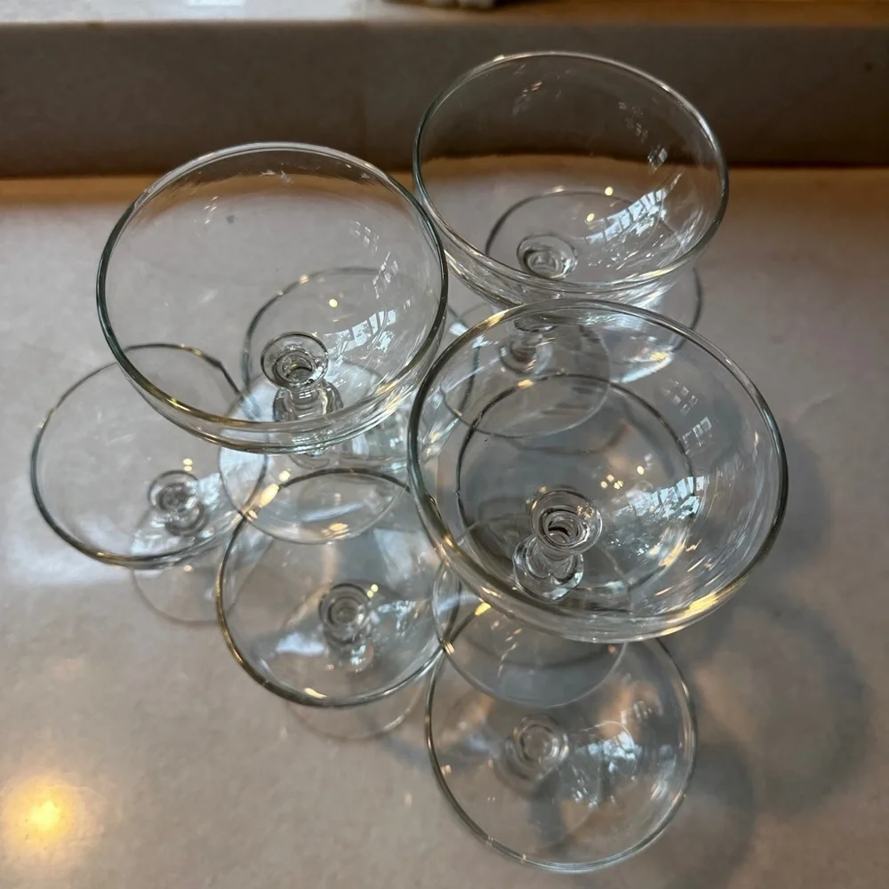 Set of 9 vintage champagne glasses.